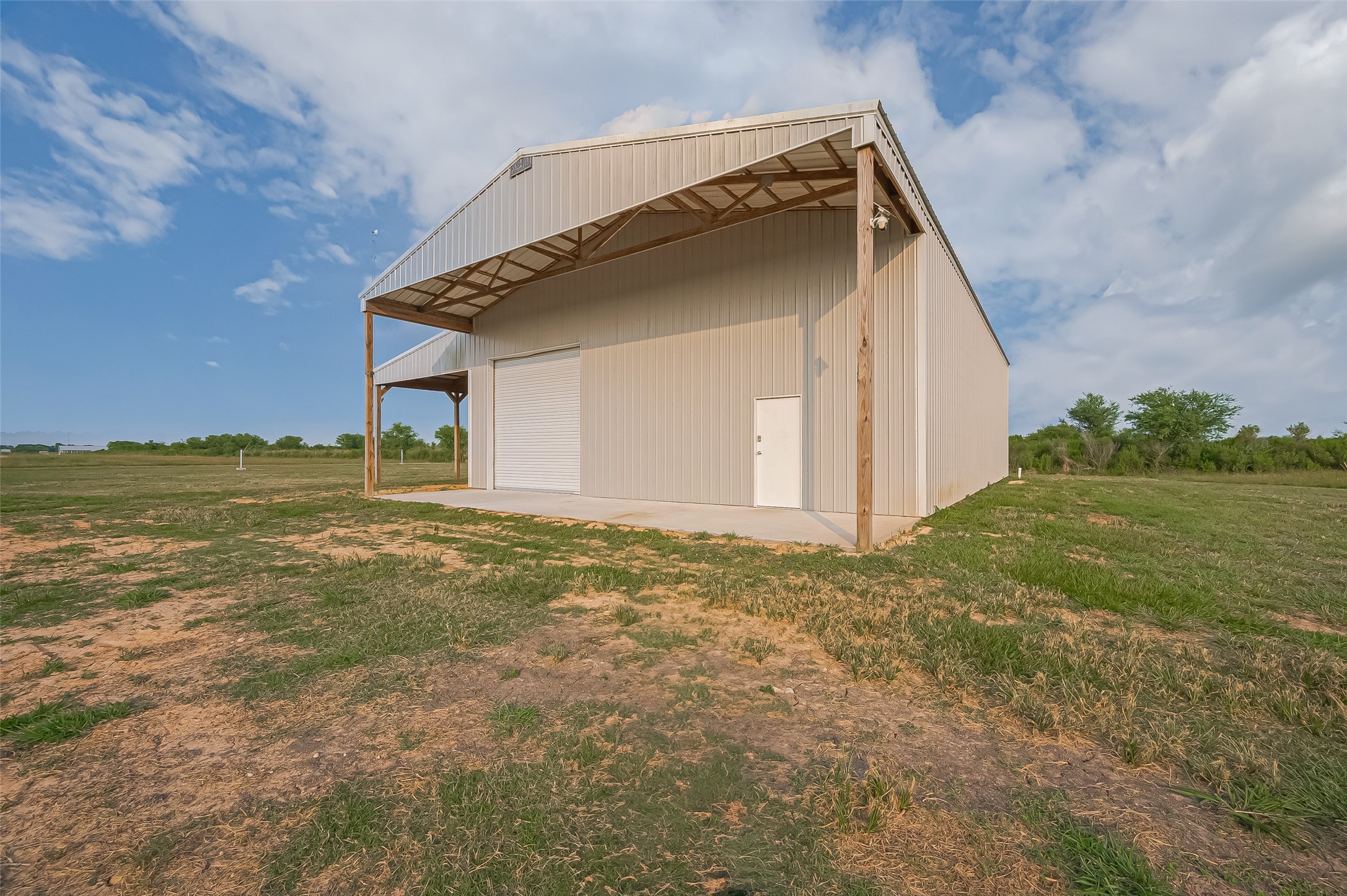 16702 Dipple Road Guy, TX 77444 - Photo 40 of 50 a view of a house with a yard