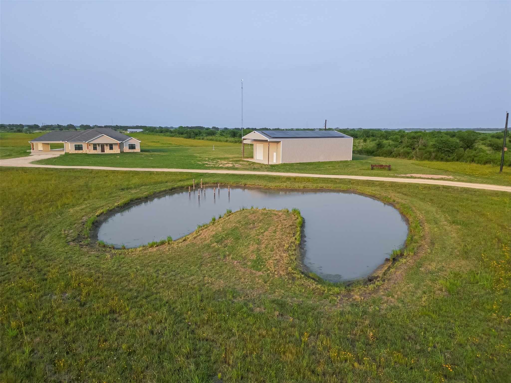 16702 Dipple Road Guy, TX 77444 - Photo 4 of 50 a view of a swimming pool and an outdoor space