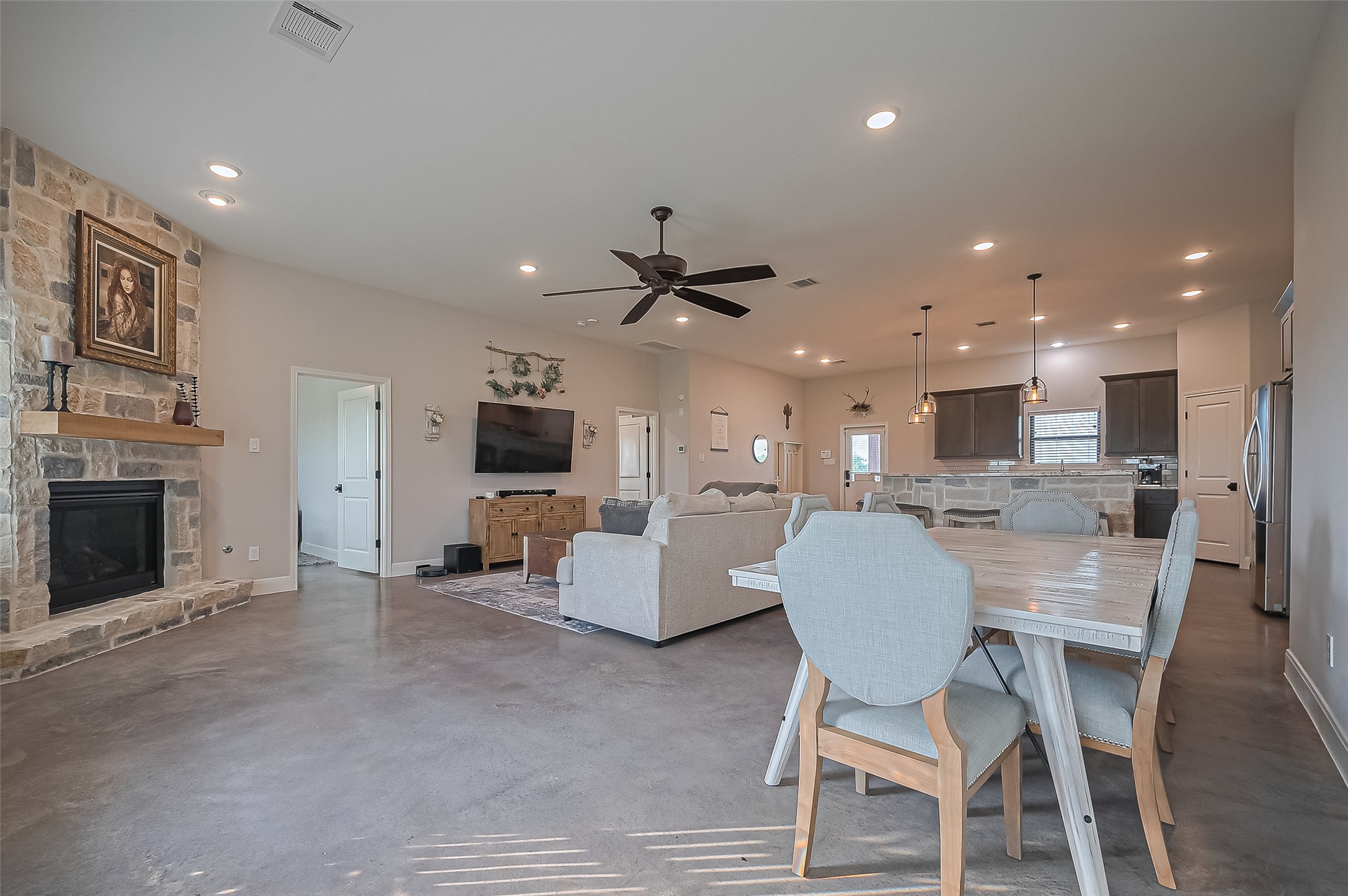 16702 Dipple Road Guy, TX 77444 - Photo 6 of 50 a living room with furniture and a fireplace