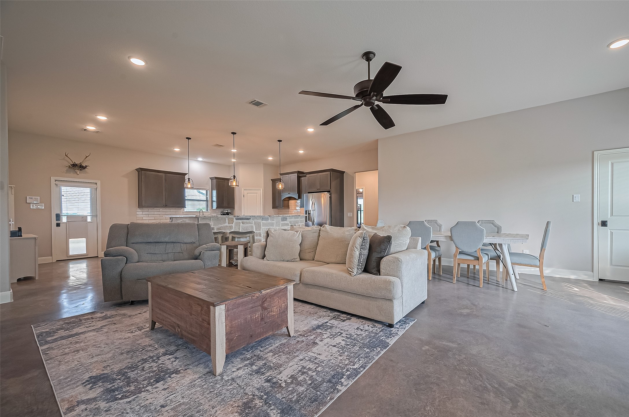 16702 Dipple Road Guy, TX 77444 - Photo 8 of 50 a living room with furniture and a wooden floor