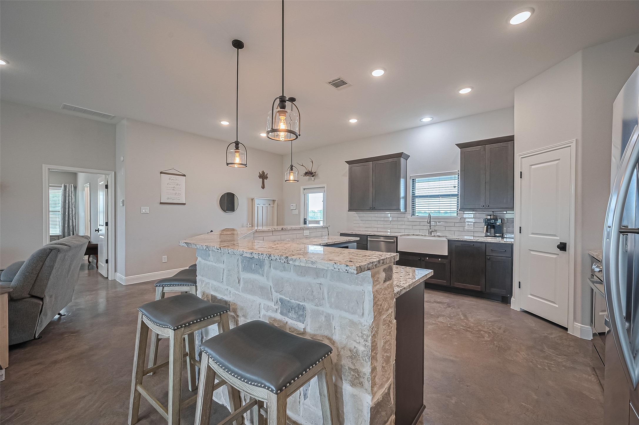 16702 Dipple Road Guy, TX 77444 - Photo 10 of 50 a large kitchen with a table and chairs