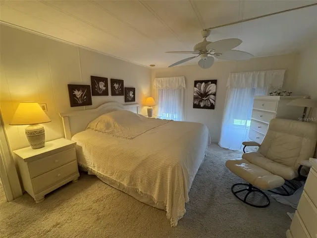 a bed room with a bed and a couch