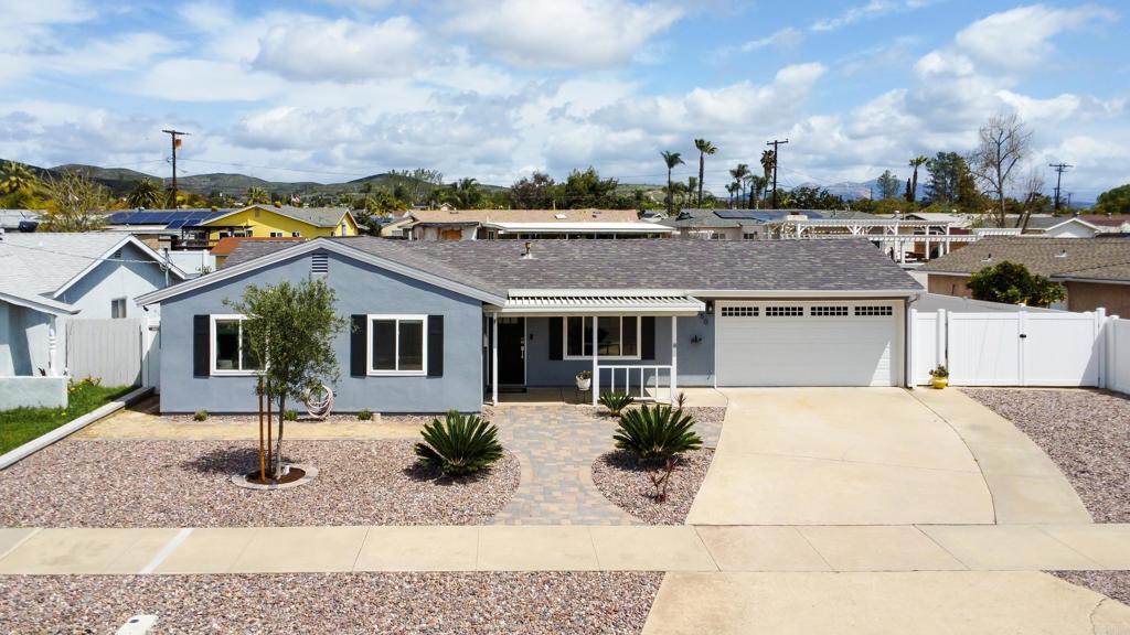 a view of a house with roof deck
