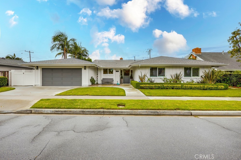 2879 Clubhouse Road Costa Mesa, CA 92626 - Photo 2 of 64 a view of house with outdoor space and swimming pool