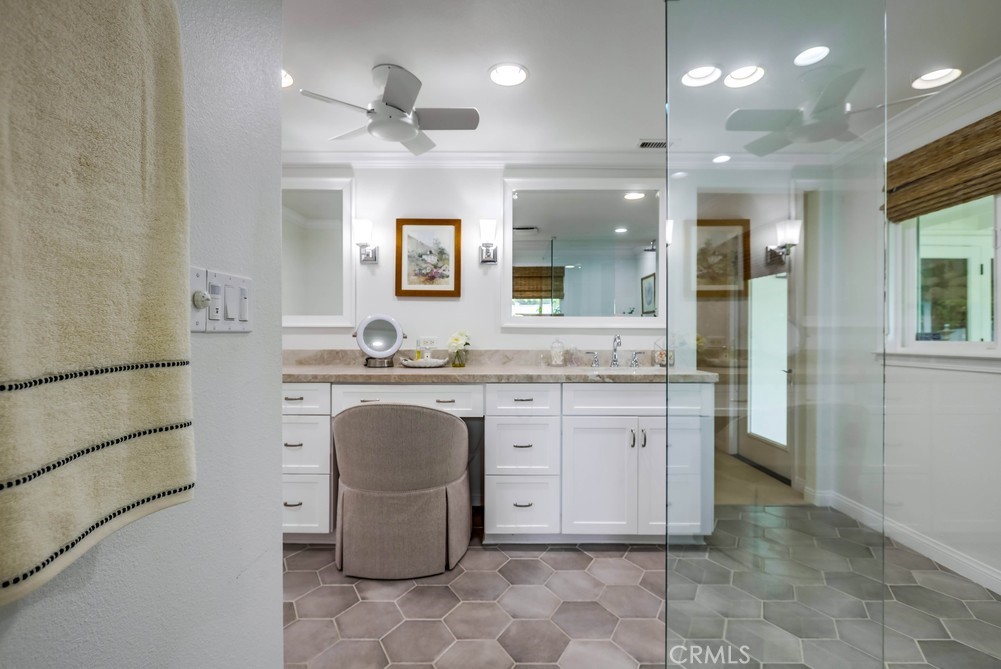 2879 Clubhouse Road Costa Mesa, CA 92626 - Photo 40 of 64 a bathroom with a granite countertop sink mirror and toilet