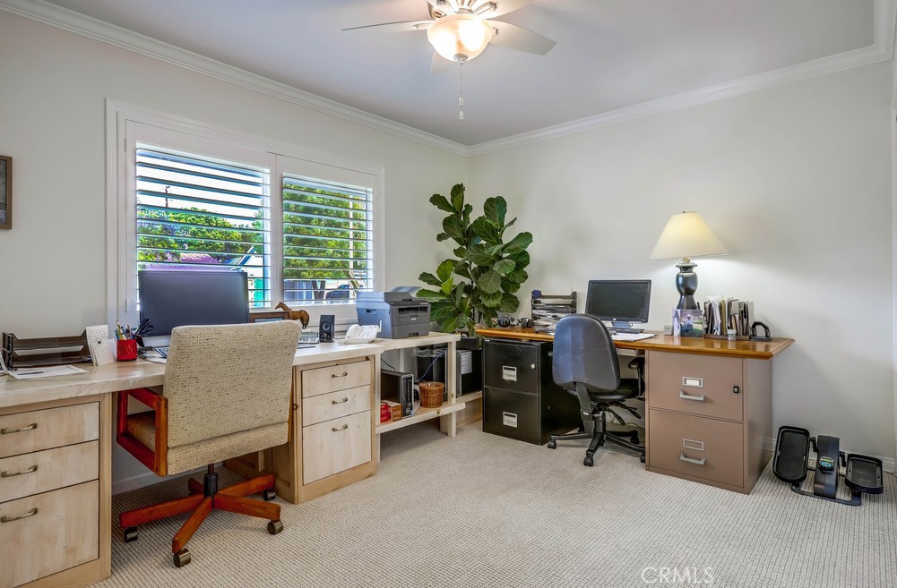 2879 Clubhouse Road Costa Mesa, CA 92626 - Photo 43 of 64 a room with furniture and a window