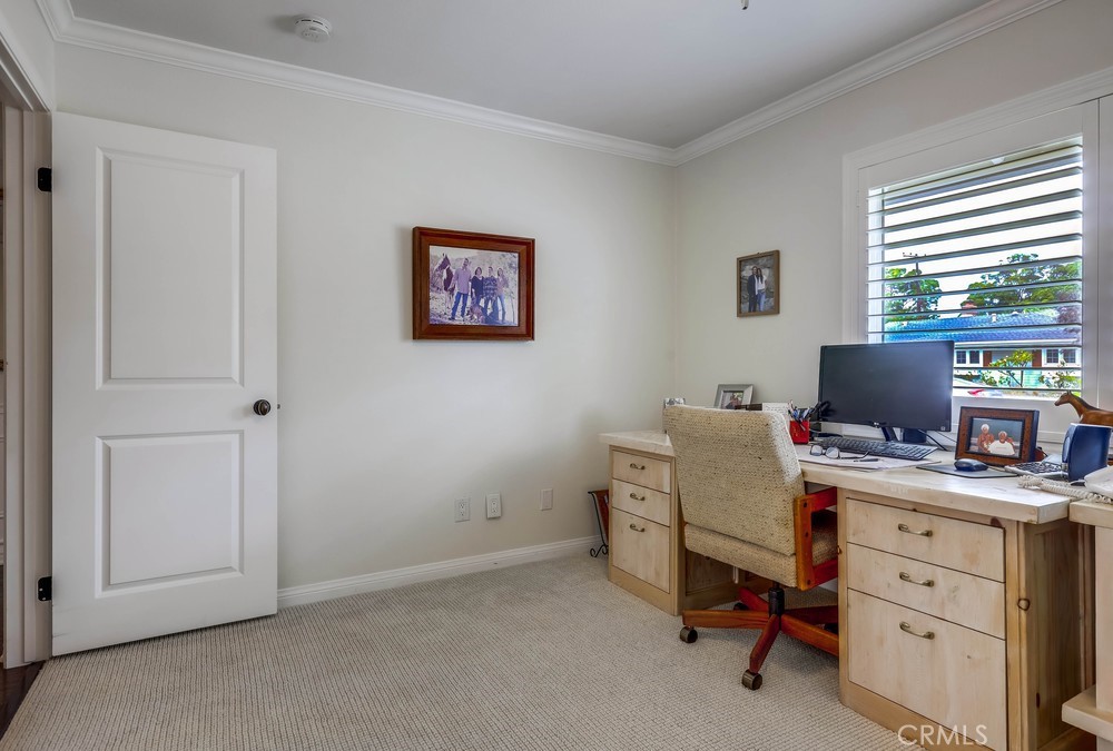 2879 Clubhouse Road Costa Mesa, CA 92626 - Photo 44 of 64 a view of a workspace with furniture and a window