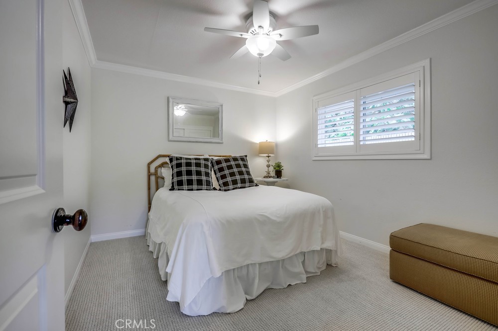 2879 Clubhouse Road Costa Mesa, CA 92626 - Photo 49 of 64 a bedroom with a bed and window