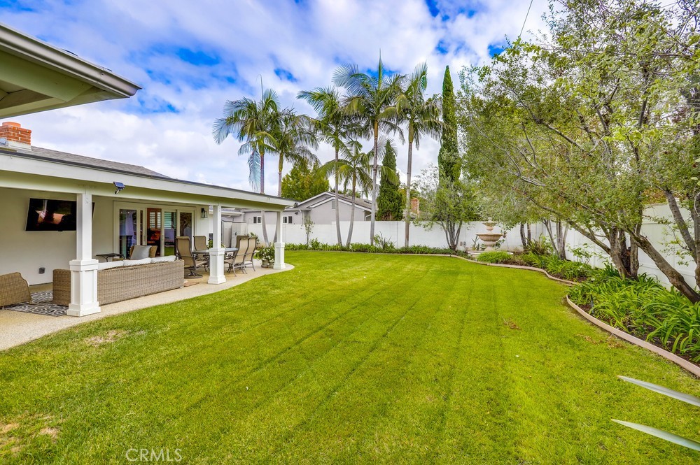 2879 Clubhouse Road Costa Mesa, CA 92626 - Photo 64 of 64 a view of house with swimming pool outdoor seating
