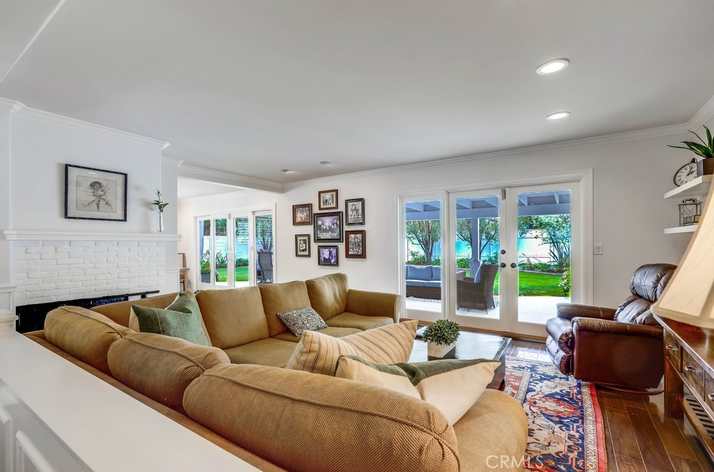 2879 Clubhouse Road Costa Mesa, CA 92626 - Photo 7 of 64 a living room with furniture and a large window