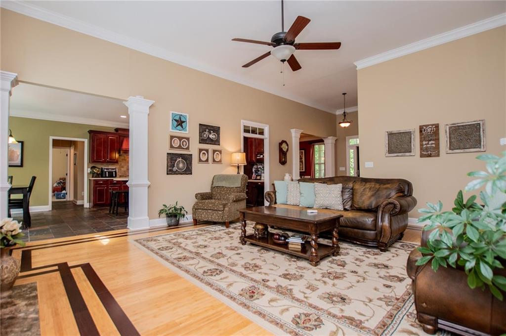 5522 Tyree Road Winston, GA 30187 - Photo 12 of 45 a living room with furniture and wooden floor