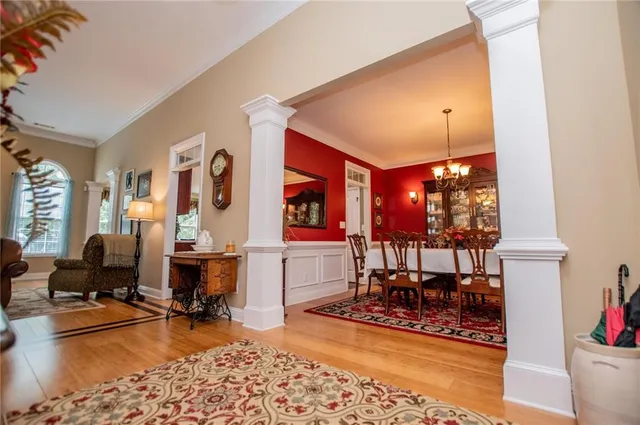 a view of a dining room with furniture window and outside view