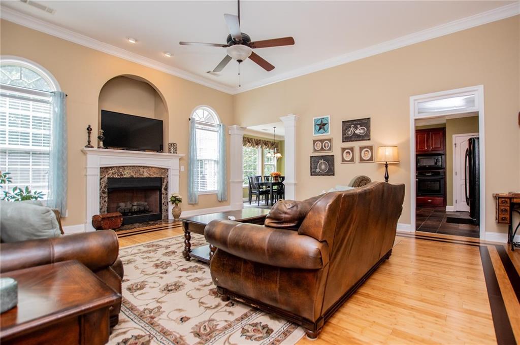 5522 Tyree Road Winston, GA 30187 - Photo 29 of 45 a living room with furniture and a fireplace