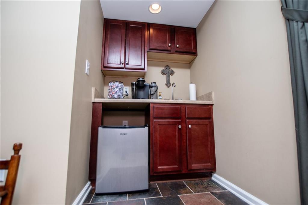 5522 Tyree Road Winston, GA 30187 - Photo 31 of 45 a view of cabinets and wooden floor