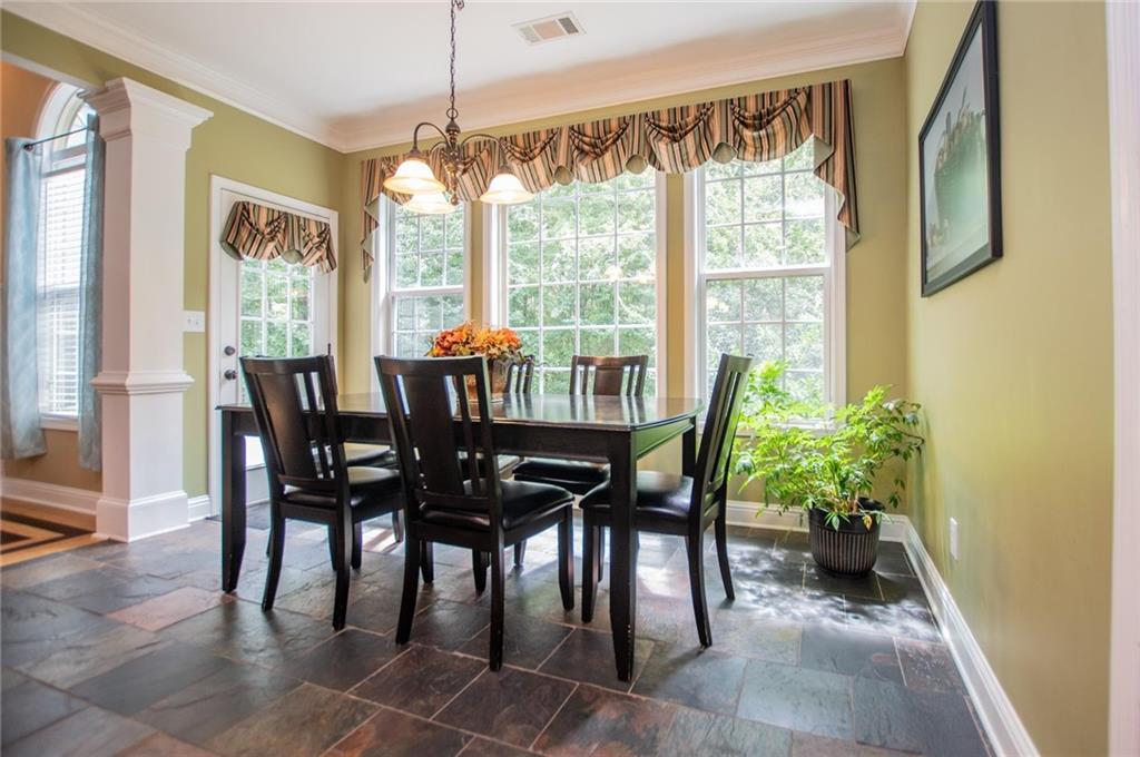 5522 Tyree Road Winston, GA 30187 - Photo 35 of 45 a view of a dining room with furniture window and outside view
