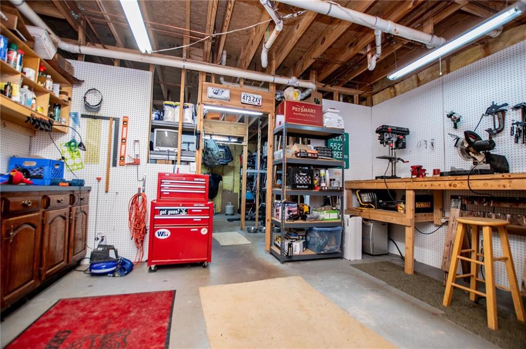 5522 Tyree Road Winston, GA 30187 - Photo 36 of 45 a utility room with lot of furniture and toys