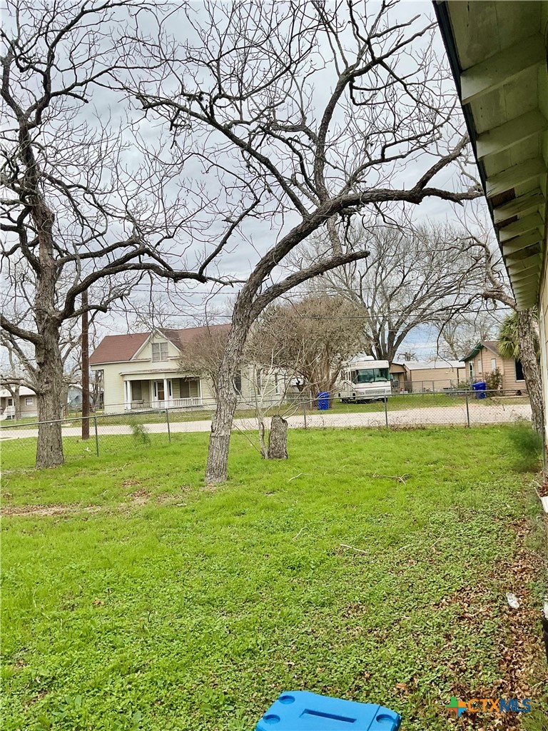 102 Clark Street Yoakum, TX 77995 - Photo 18 of 18 a view of yard with tree s