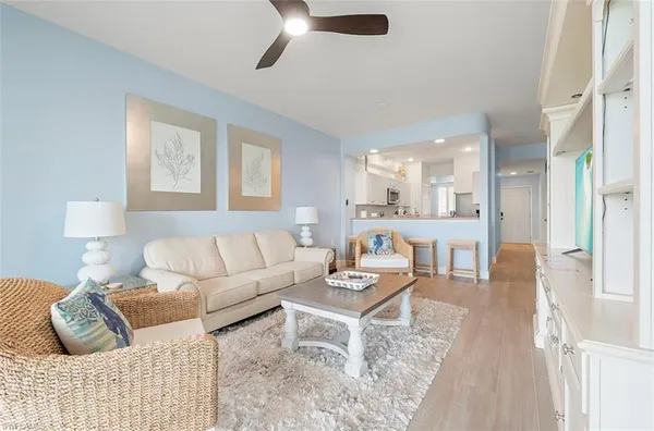 a living room with furniture and a table