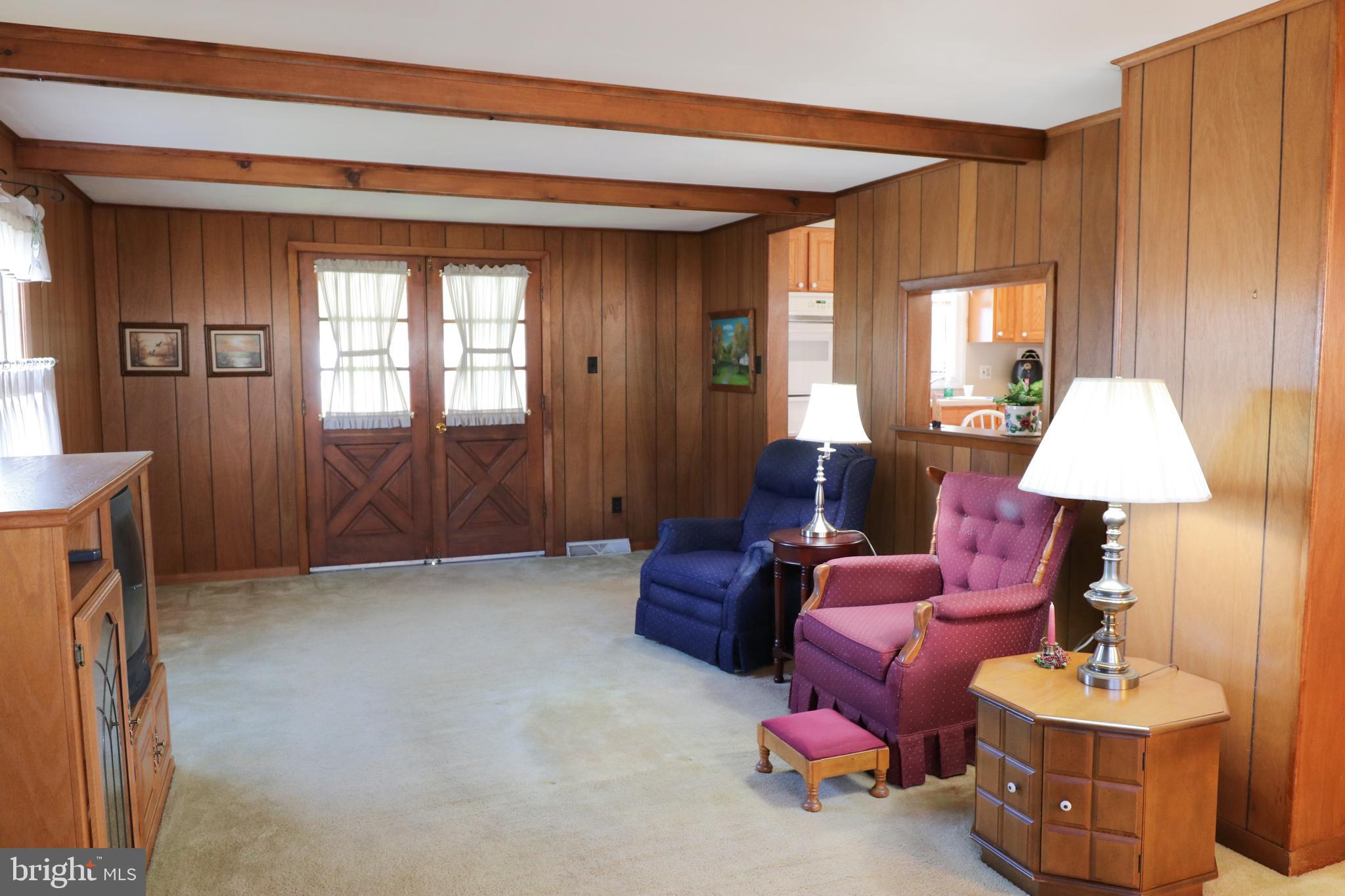 14 Olney Circle Haddonfield, NJ 08033 - Photo 7 of 21 a living room with furniture and a window