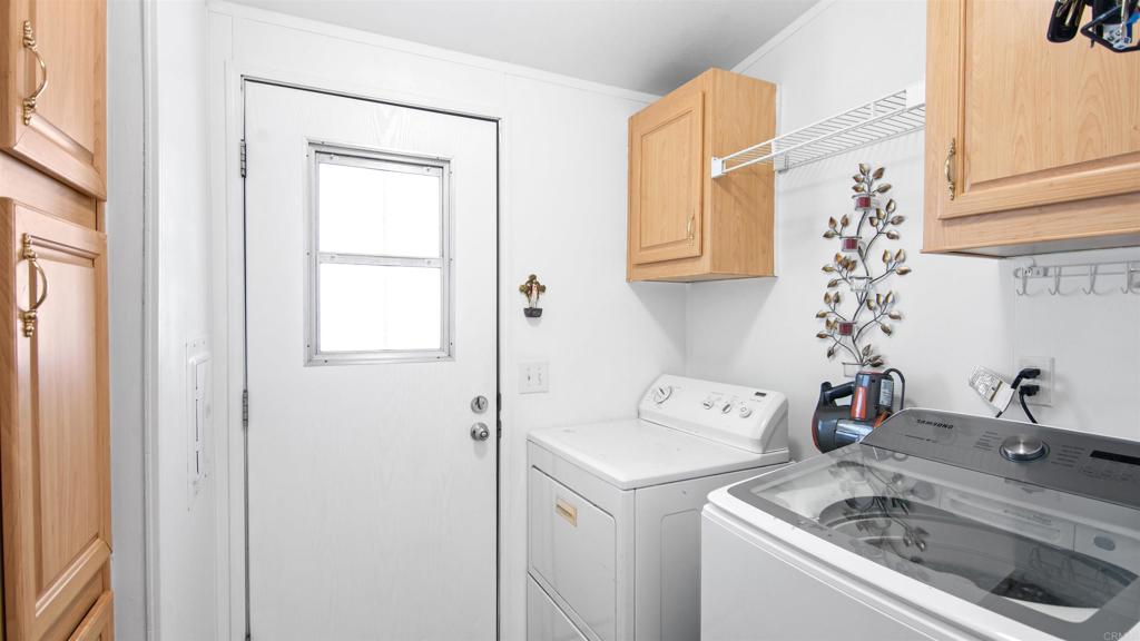 1455 Alturas Road, Unit 55 Fallbrook, CA 92028 - Photo 22 of 31 a utility room with dryer and washer