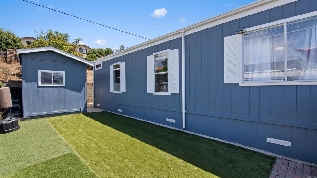 1455 Alturas Road, Unit 55 Fallbrook, CA 92028 - Photo 23 of 31 a view of an house with backyard and garden