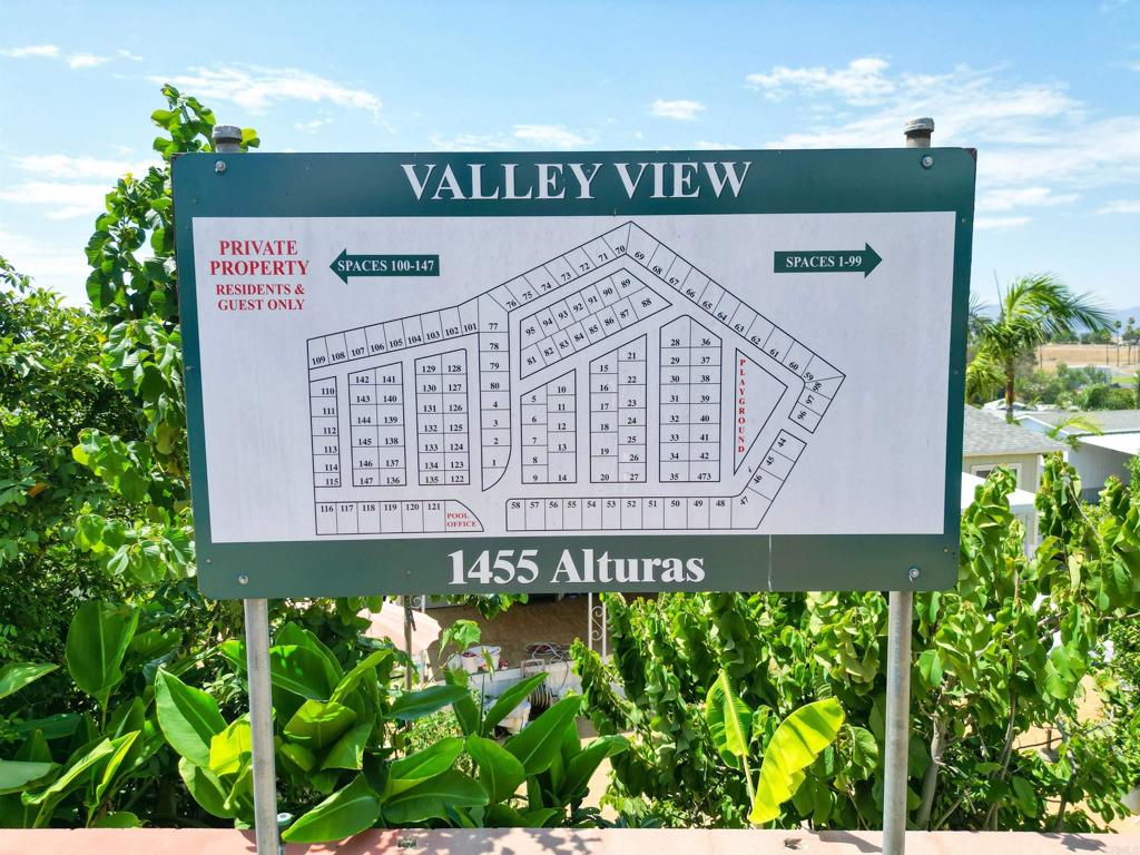 1455 Alturas Road, Unit 55 Fallbrook, CA 92028 - Photo 9 of 31 a sign on the side of a building