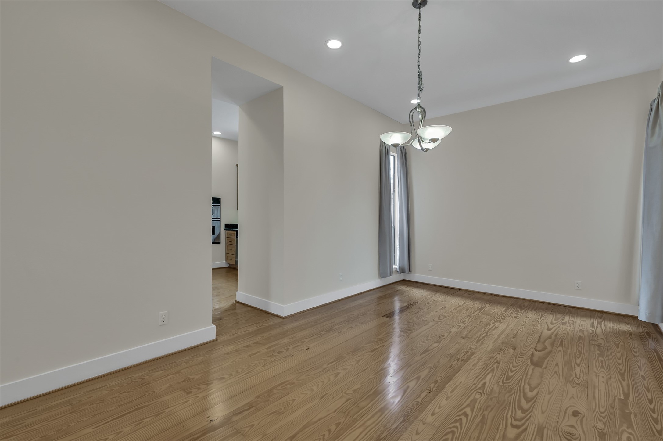 1503 California Street, Unit B Houston, TX 77006 - Photo 9 of 23 a view of a room with wooden floor