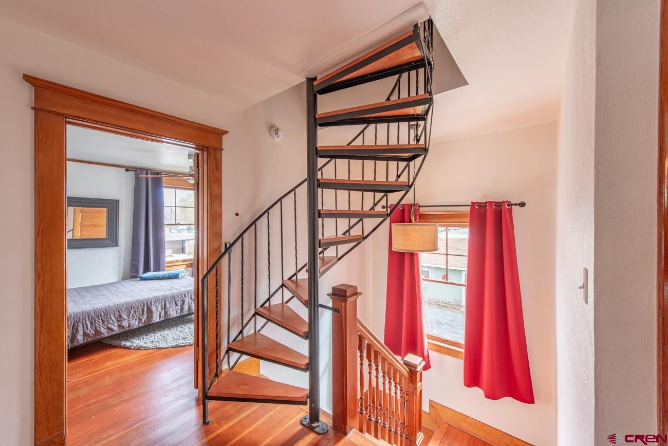 746 South 2nd Street Montrose, CO 81401 - Photo 37 of 43 a view of front door with wooden floor and a front door