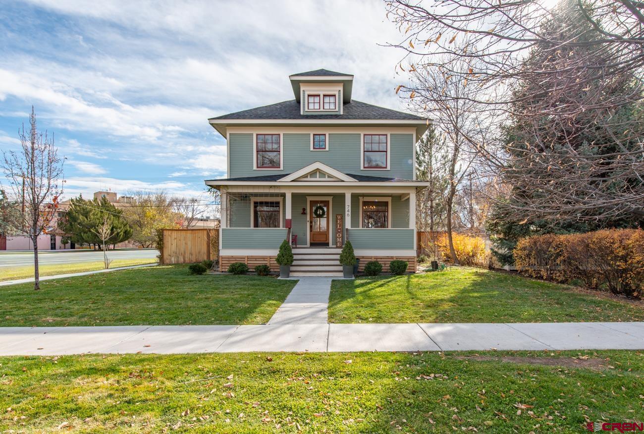 746 South 2nd Street Montrose, CO 81401 - Photo 41 of 43 a front view of a house with a yard