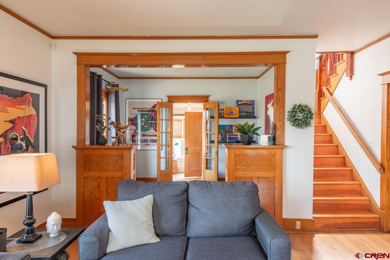746 South 2nd Street Montrose, CO 81401 - Photo 8 of 43 a living room with furniture and a potted plant