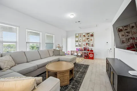 a living room with furniture and a couch