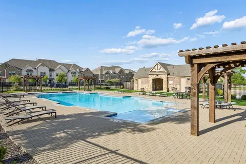 a view of a house with a swimming pool