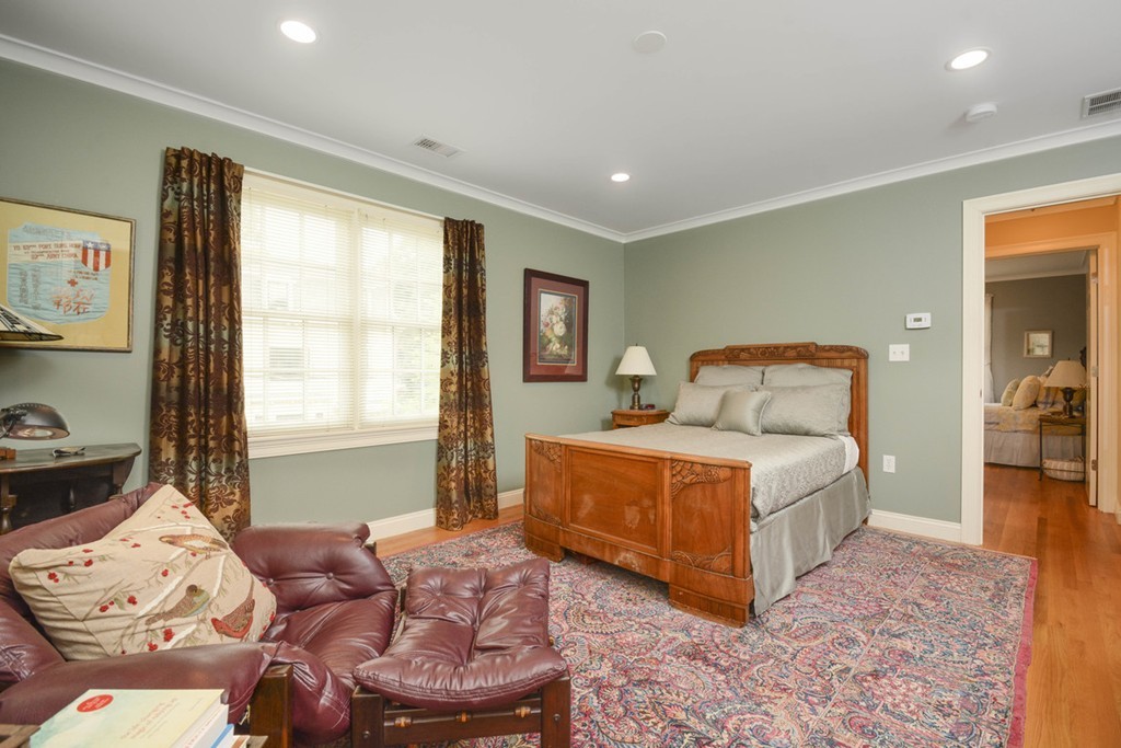 15 Cerina Road, Unit 15 Boston, MA 02130 - Photo 11 of 28 a bedroom with a bed and wooden floor
