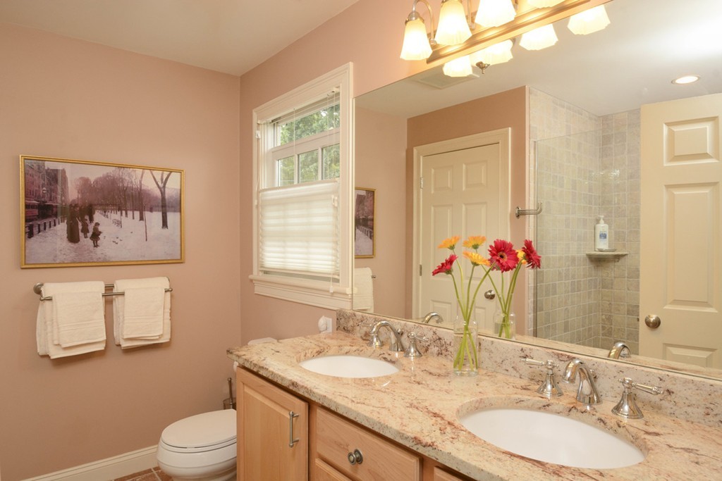 15 Cerina Road, Unit 15 Boston, MA 02130 - Photo 13 of 28 a bathroom with a granite countertop sink mirror and a window