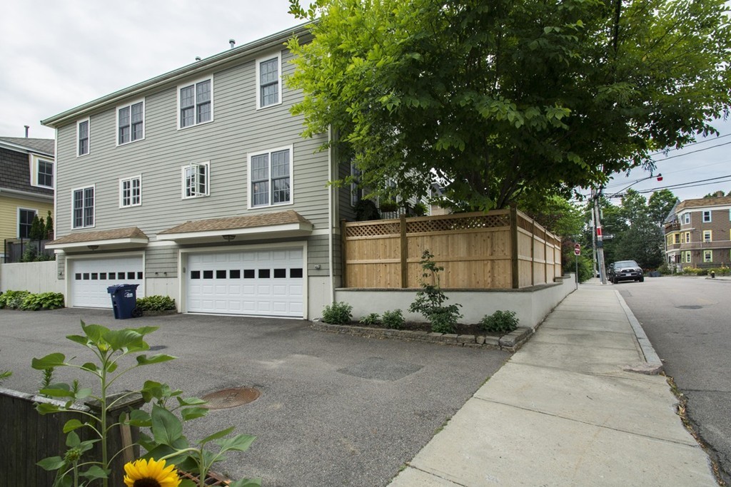 15 Cerina Road, Unit 15 Boston, MA 02130 - Photo 26 of 28 a house with sign broad