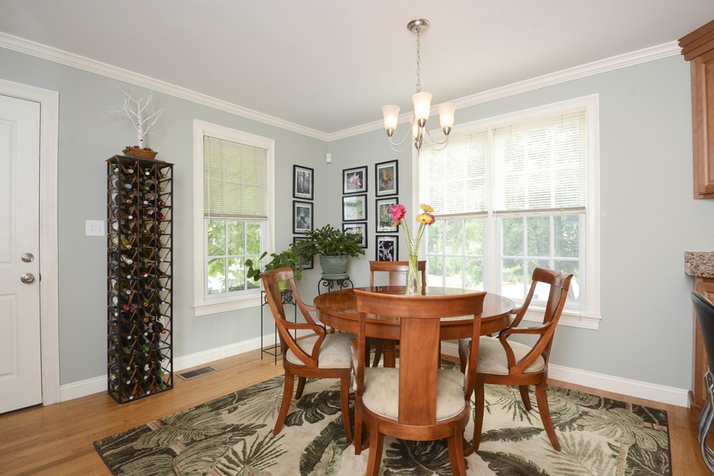 15 Cerina Road, Unit 15 Boston, MA 02130 - Photo 5 of 28 a view of a dining room with furniture window and wooden floor