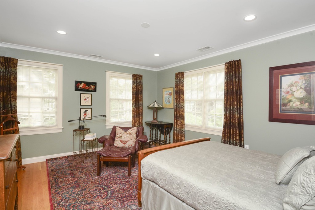 15 Cerina Road, Unit 15 Boston, MA 02130 - Photo 10 of 28 a spacious bedroom with a large bed and a window