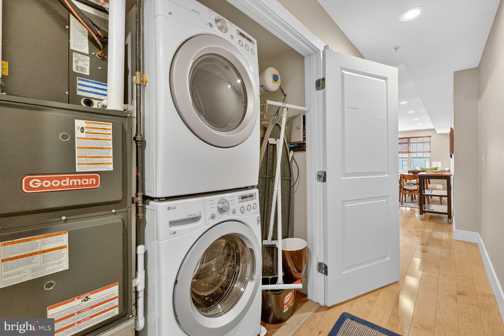 816 Kennedy Street Northwest, Unit 3 Washington, DC 20011 - Photo 4 of 9 a view of a hallway with washer and dryer