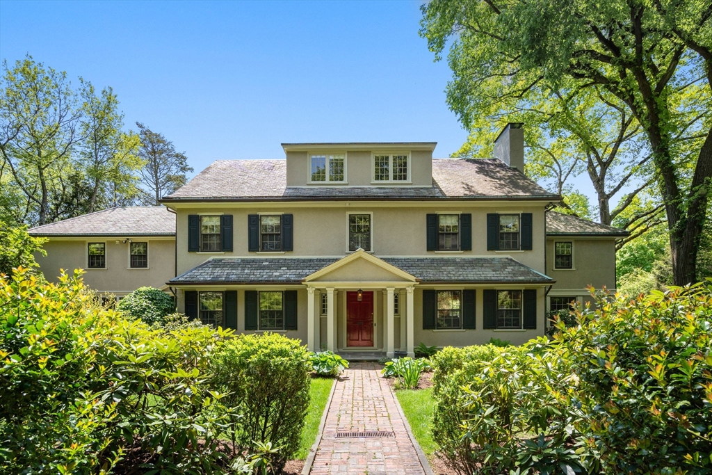 388 Warren Street Brookline, MA 02445 - Photo 1 of 34 a front view of a house with a yard