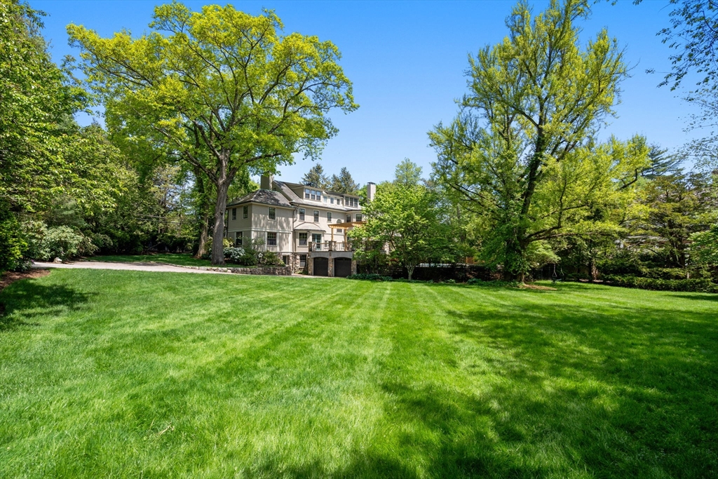 388 Warren Street Brookline, MA 02445 - Photo 29 of 34 a view of a house with a big yard