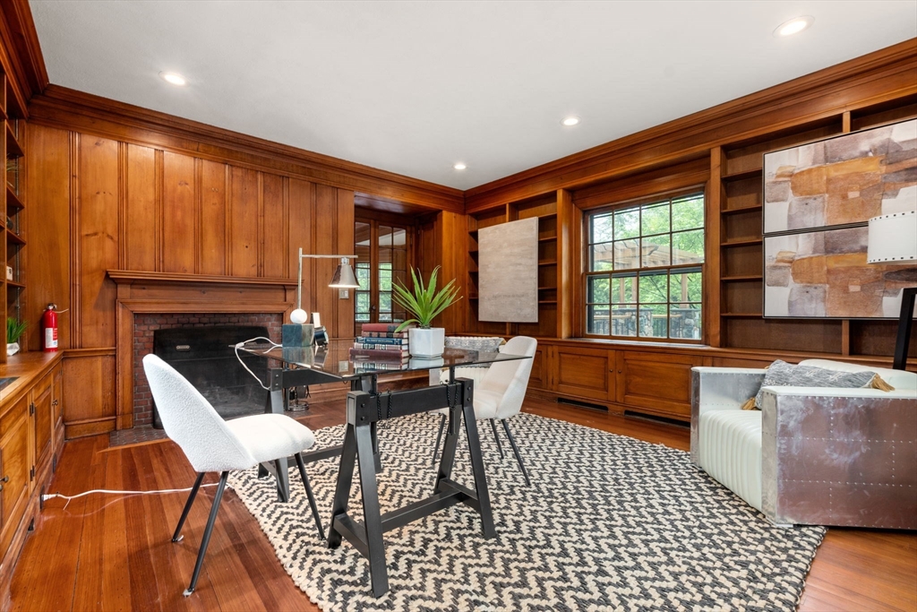 388 Warren Street Brookline, MA 02445 - Photo 5 of 34 a dining room with furniture and a floor to ceiling window