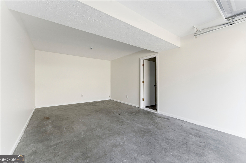 1496 Cherry Hill Road Southwest Conyers, GA 30094 - Photo 17 of 20 a view of an empty room