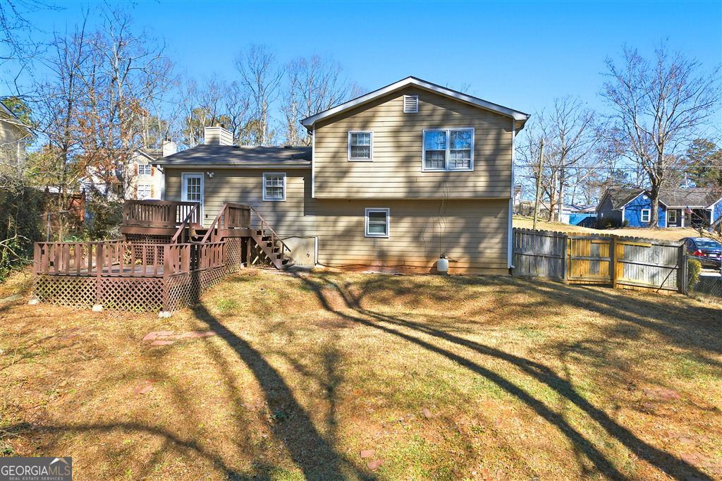 1496 Cherry Hill Road Southwest Conyers, GA 30094 - Photo 20 of 20 a front view of a house with a yard