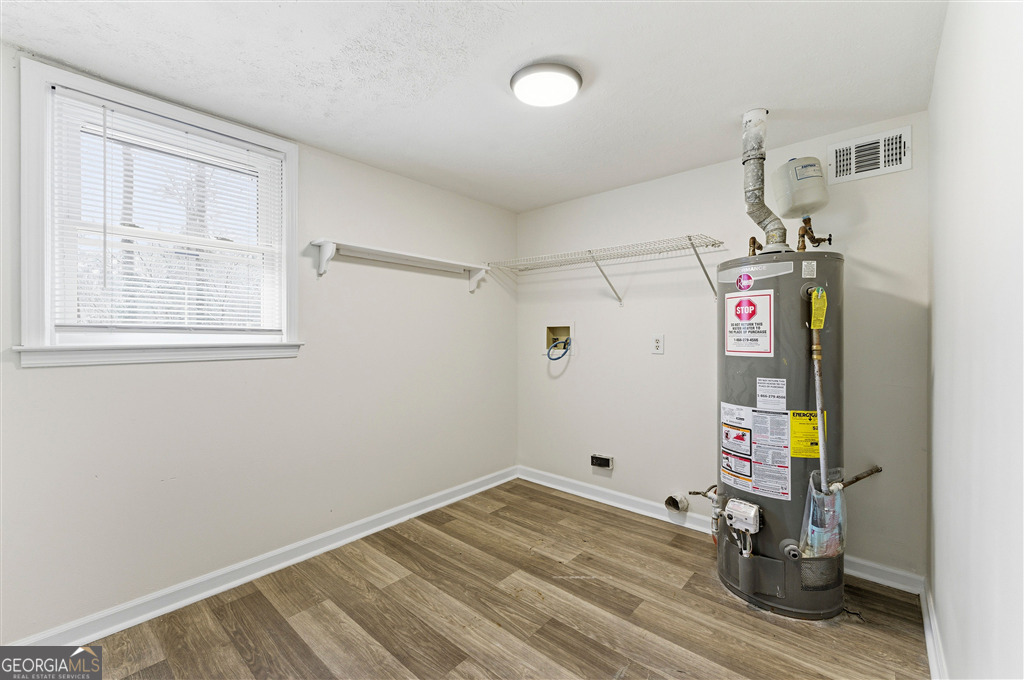 1496 Cherry Hill Road Southwest Conyers, GA 30094 - Photo 9 of 20 a view of a storage & utility room