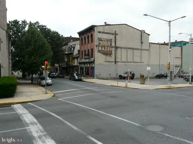 a front view of a building with street