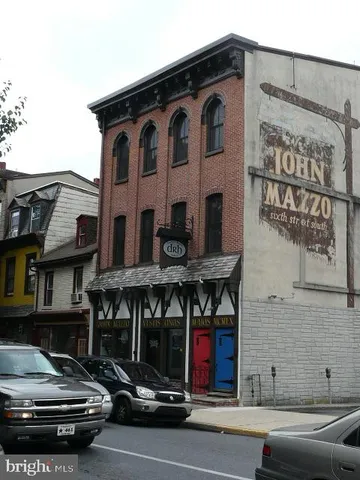 a view of a car park in front of building
