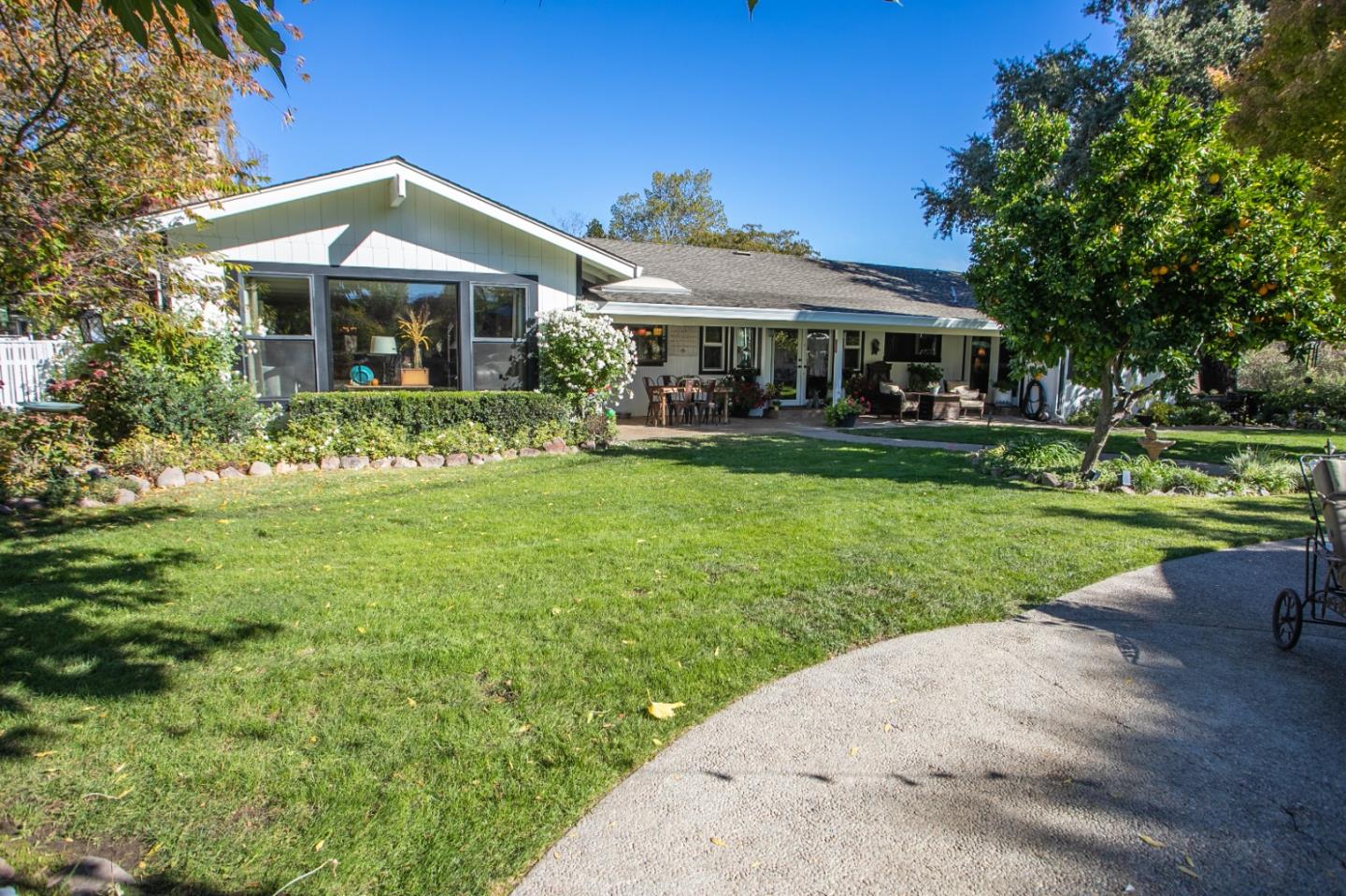 1990 Day Road Gilroy, CA 95020 - Photo 11 of 42 a front view of a house with garden