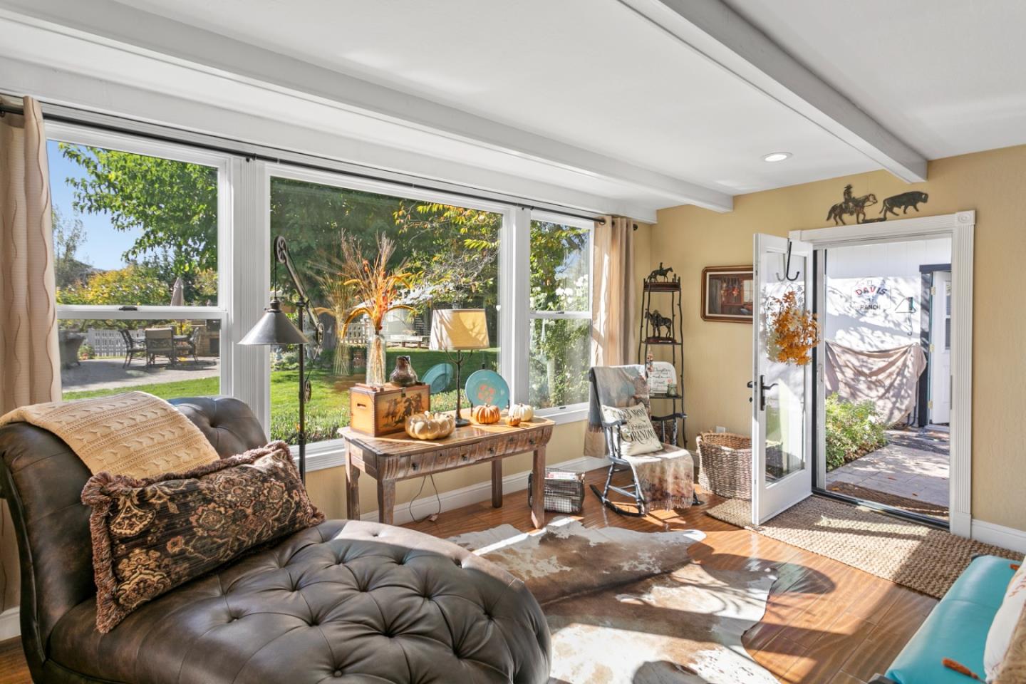1990 Day Road Gilroy, CA 95020 - Photo 13 of 42 a living room with furniture and a floor to ceiling window