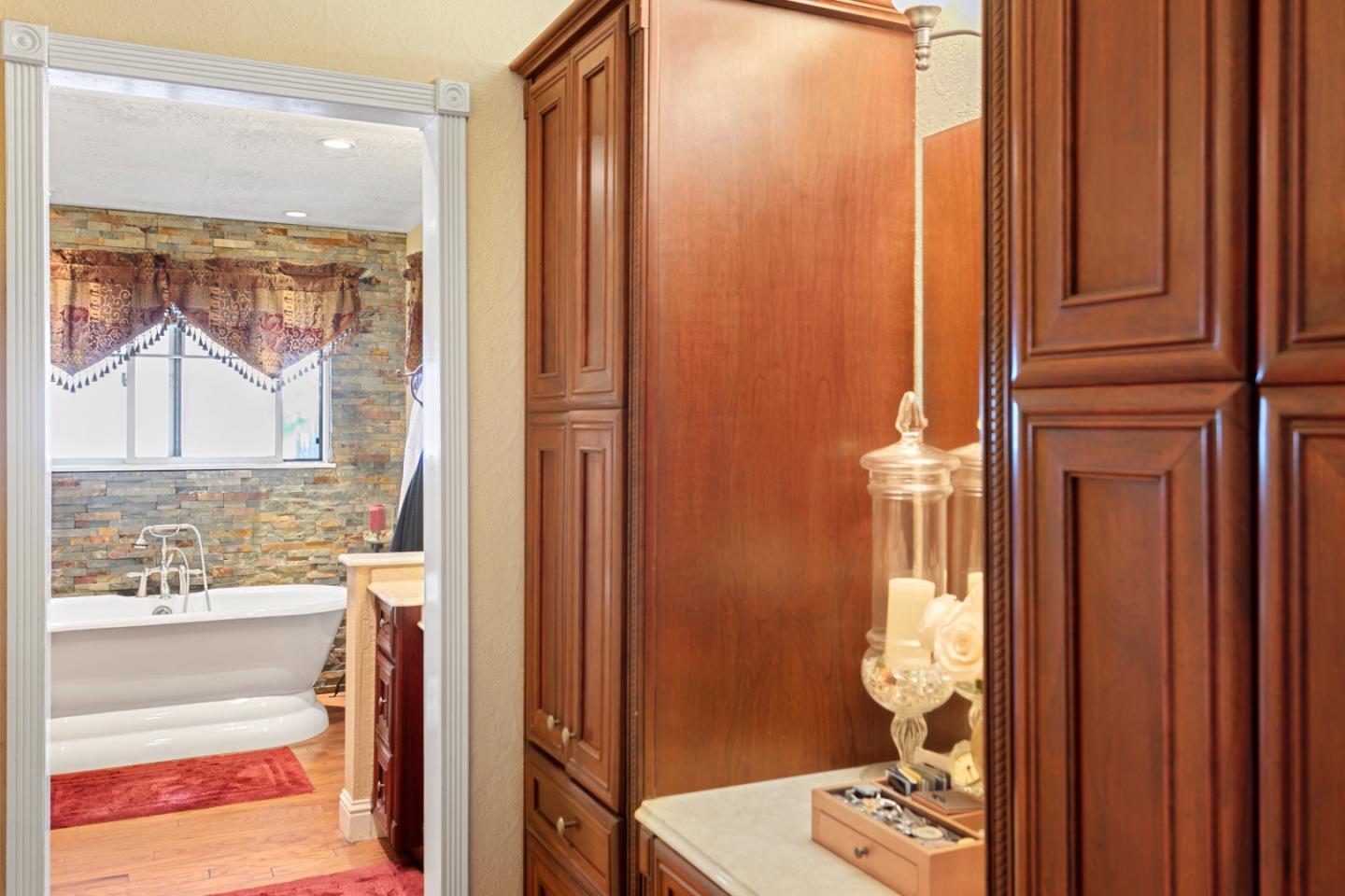1990 Day Road Gilroy, CA 95020 - Photo 17 of 42 a bathroom with a sink and a mirror