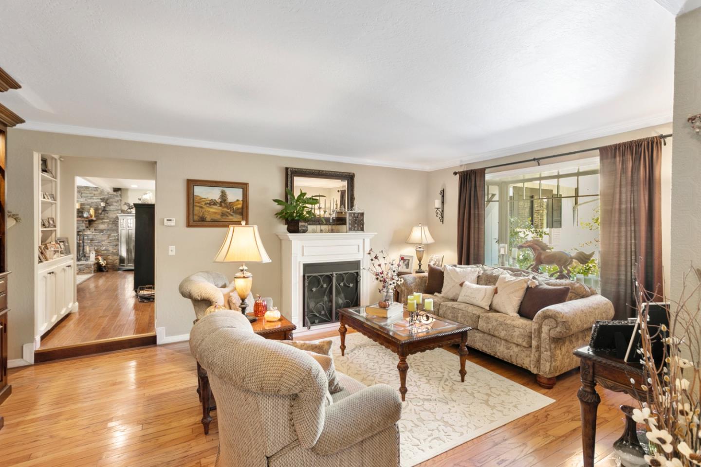 1990 Day Road Gilroy, CA 95020 - Photo 21 of 42 a living room with furniture and a fireplace